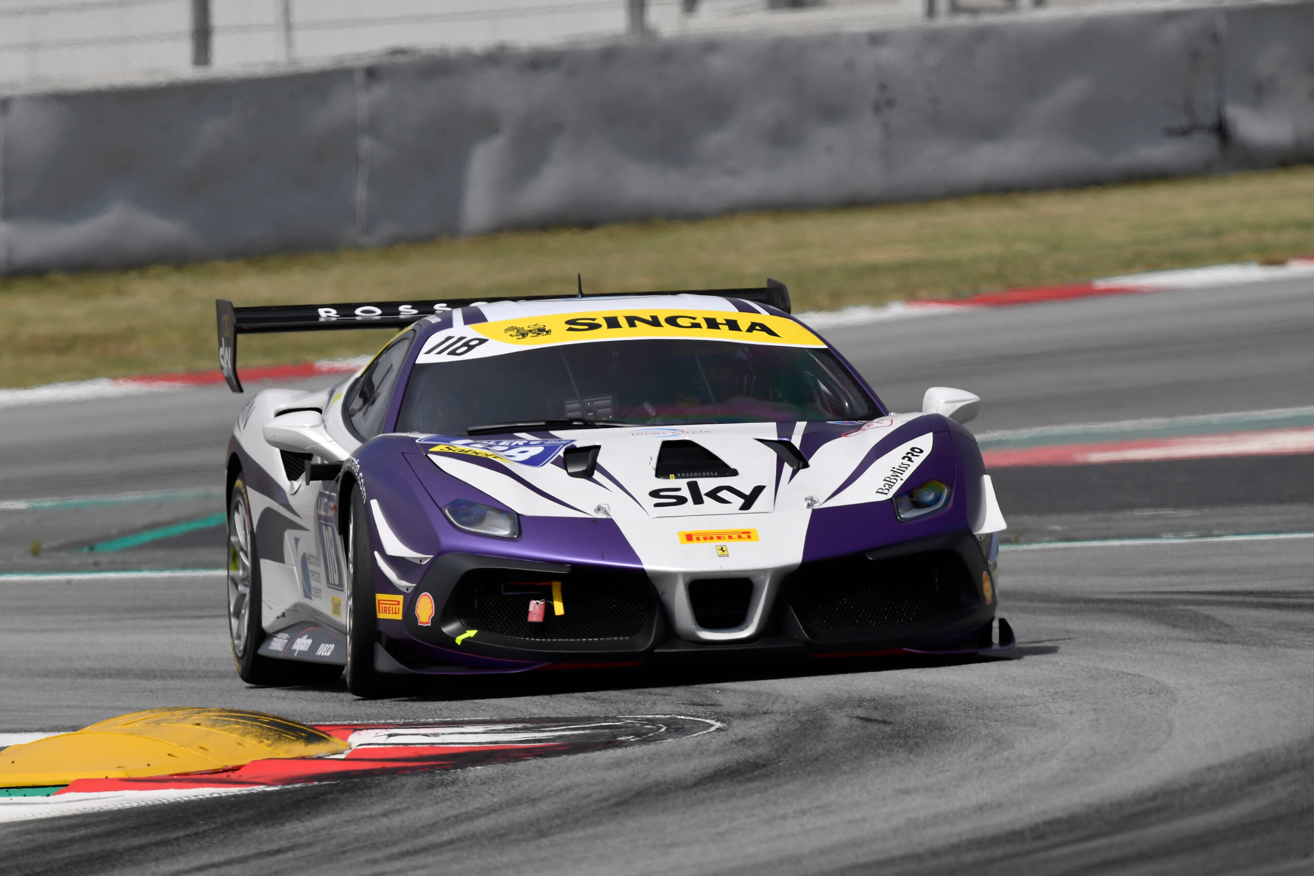 Electronic Merchant Systems Race Team Driver James Weiland finishing P1 in Barcelona Ferrari Challenge